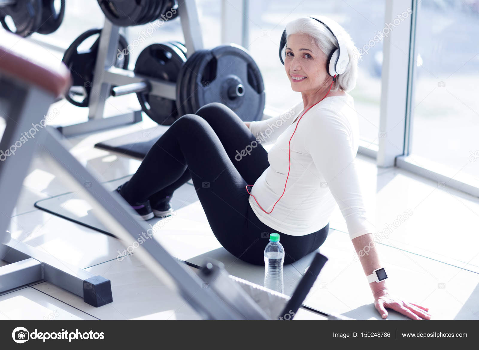 depositphotos_159248786-stock-photo-lady-with-headphones-sitting-at.jpg